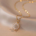 Collar Girasol Giratorio 🌻 Enchapado en Oro ✨ | Elegancia y Relajación
